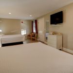Suite 132, two queen beds in spacious room.
