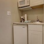 Suite 135, kitchenette furnished with small appliances.
