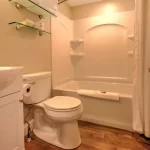 Rooms 201 – 212, private bathroom with shower and tub.