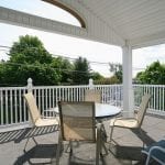 Apartment 333, ample outdoor seating under covered deck.