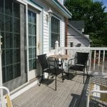 Fireplace Suites 232 & 239, semi-private deck with seating.