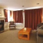 Fireplace Suites 232 & 239, ample seating around fireplace.